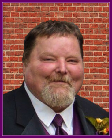 Carl D. “Chip” Rutan, II, 56