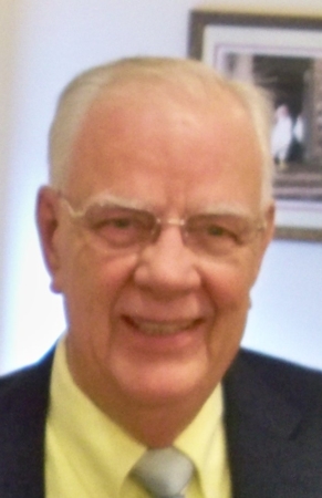 George M. Holmes, 77