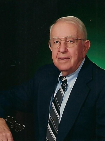 John E. Whiting, 84