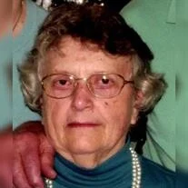 Marian L. Harman, 90