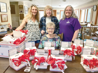 Milton American Legion Auxiliary Prepare Poppy Donation Boxes