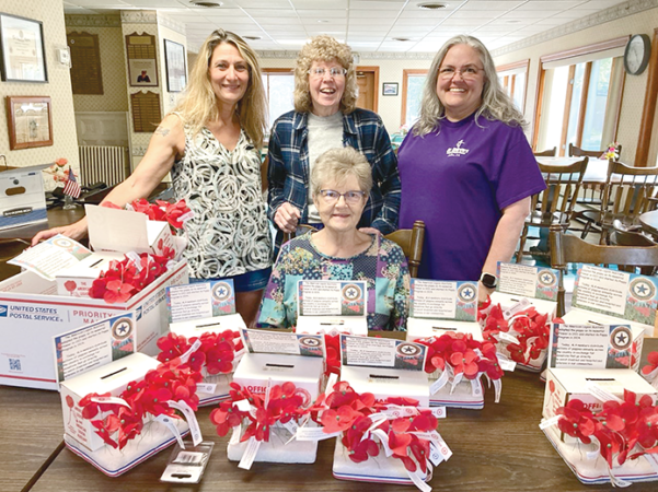 Milton American Legion Auxiliary Prepare Poppy Donation Boxes